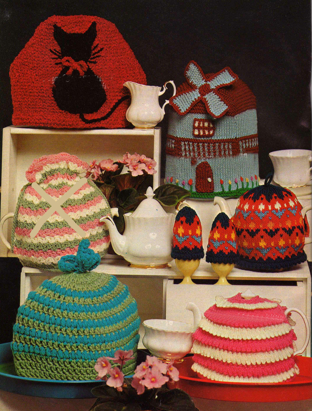 5 Tea cozies & egg covers-Novelty- patterned Various wools used- Knitting-Crochet Pattern. Downloadable PDF- pink green white not available