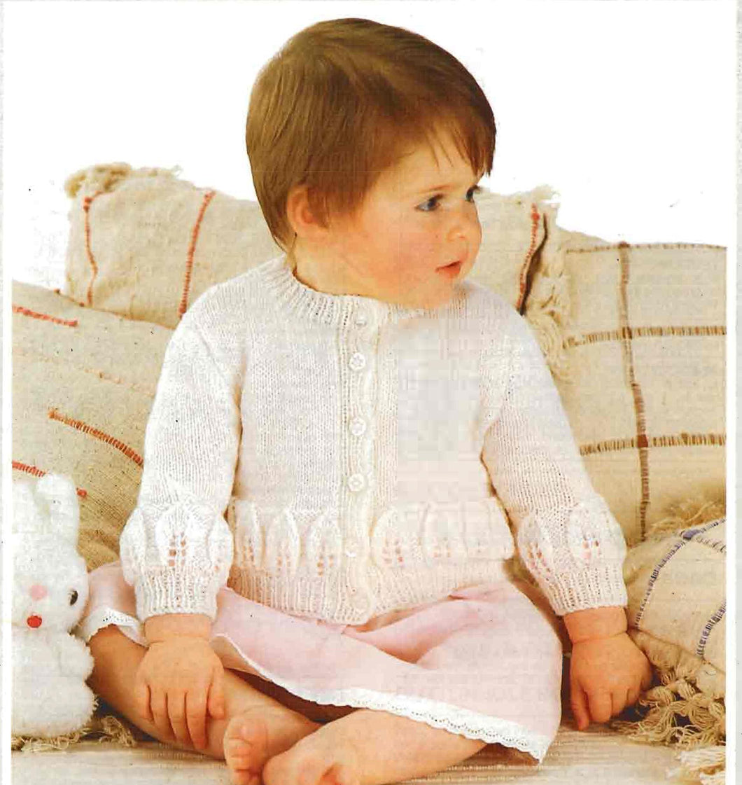 Girls'  round neck cardigan, with leave patterned border knitted in 4ply  Fingering yarn17